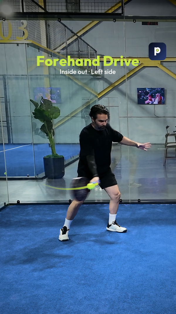 Mr Niaki in a black shirt playing an inside out forehand drive on the left side of a blue court, with a lime swing path, shot title and the PadelCue badge.